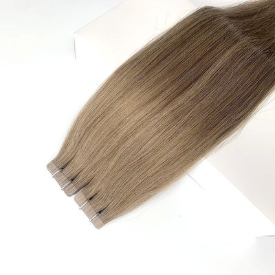 レミーヘアムティカラー内のヘアエクステンションでダブルドラッグされたロシア製ヘアテープ