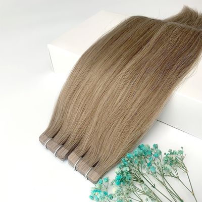 レミーヘアムティカラー内のヘアエクステンションでダブルドラッグされたロシア製ヘアテープ